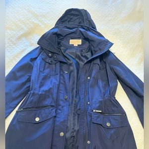 Blue Michael Kors raincoat with hoodie